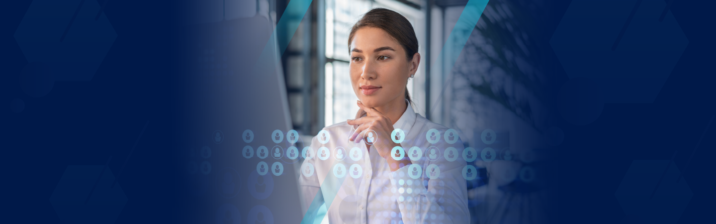 Female HR manager at laptop weighing the pros and cons of different software for background searches